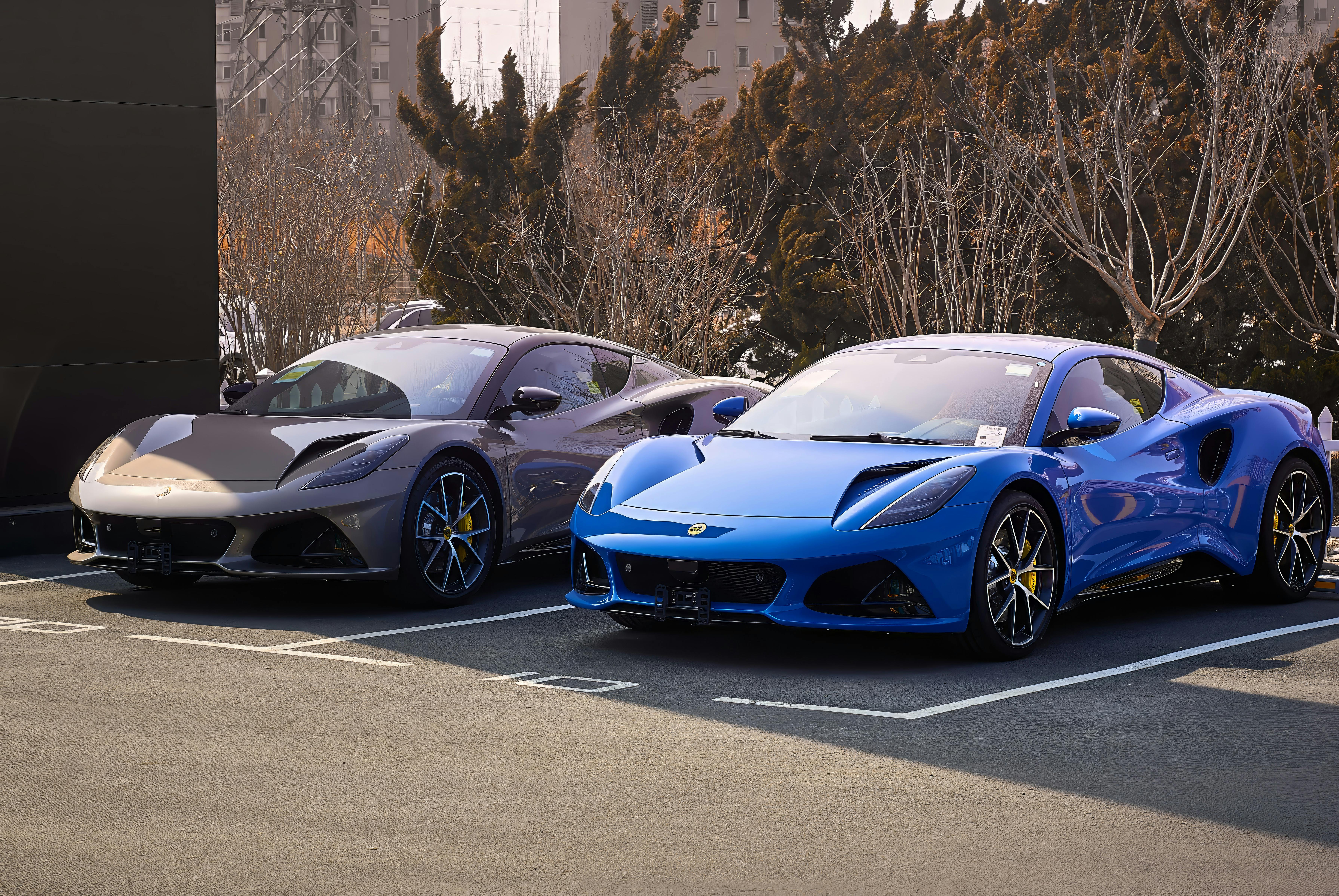 Two luxury sports cars parked in Tianjin, China, showcasing sleek designs and modern aesthetics.
